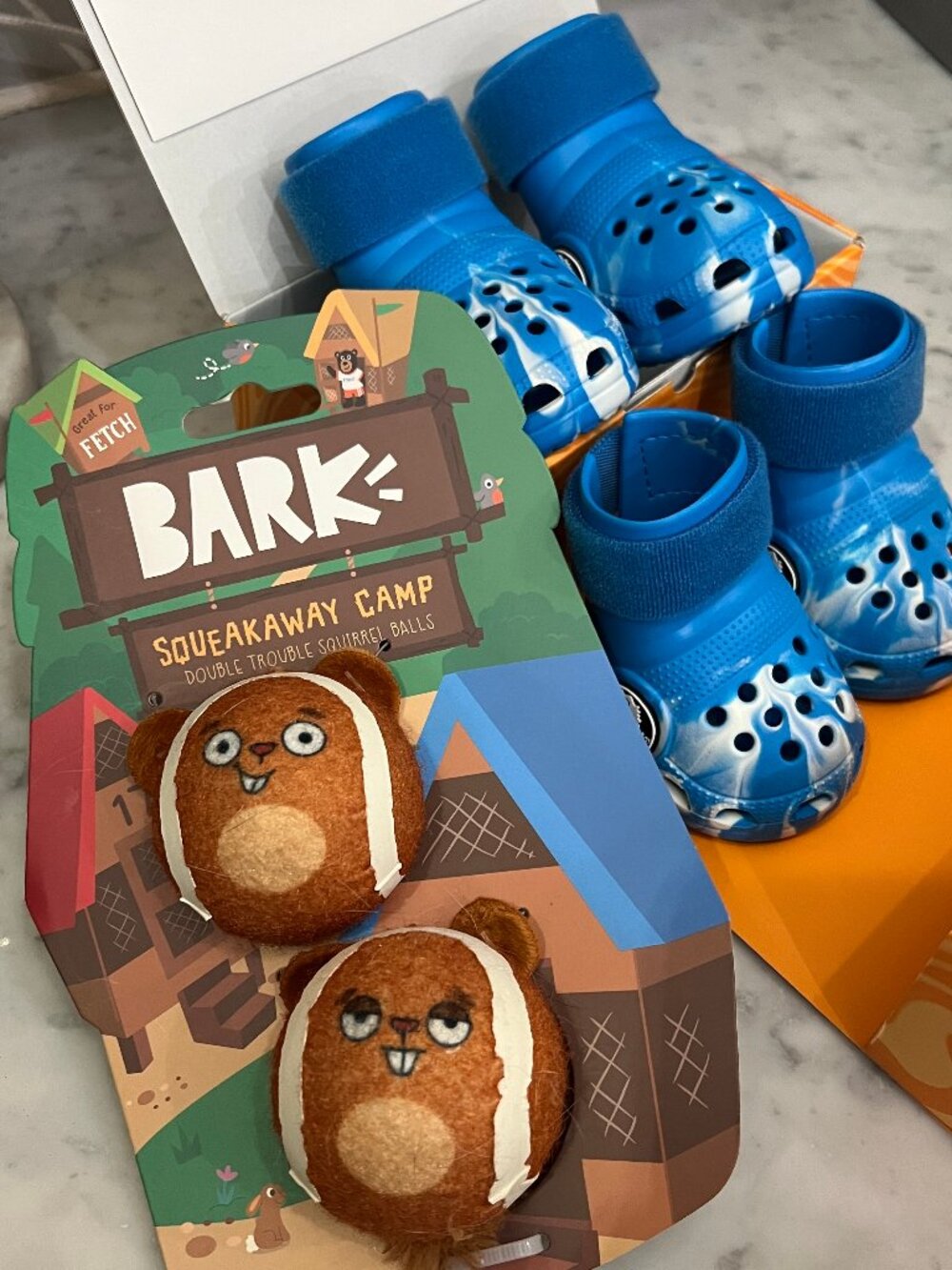 Bark dog Crocs, blue/white, size large, never worn & squirrel tennis balls